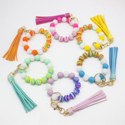 China High Quality Leather Bag Charm Key Chain Bracelet Silicone Simple Design Pendant Accessories for sale