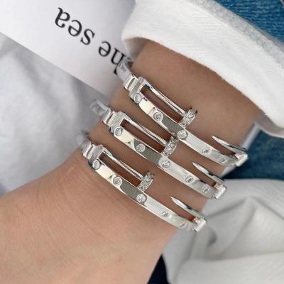 China TRENDY Fashion Creative Gold Zircon Brass Charm Bracelet High Quality Nail Cuff Bangle Finger Ring Suit Jewelry Supplies for sale