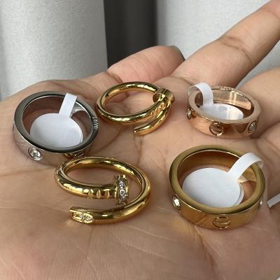 China TRENDY Luxury Famous Brand Designers Jewelry Diamonds Zircons 18k Gold Plated Stainless Steel Love Nail Ring for sale