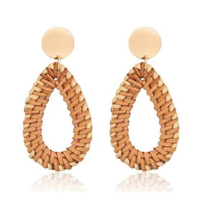 China TRENDY Handmade Style Straw Earrings Tassel Hoop Earrings 2021 Women Popular Geometric Rattan for sale