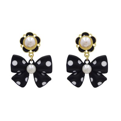 China Fashion TRENDY Gold Plated Pearl Stud Earrings Black White Dot Bow Wave Dangle Earrings For Women Girls for sale