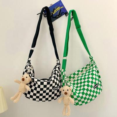 China Portable Wholesale Japanese Casual Colored Institute Of Statistics Plaid Messenger Harajuku Ladies Sling Tote Saddle Handbag Shoulder Bag With Plush Pendant for sale