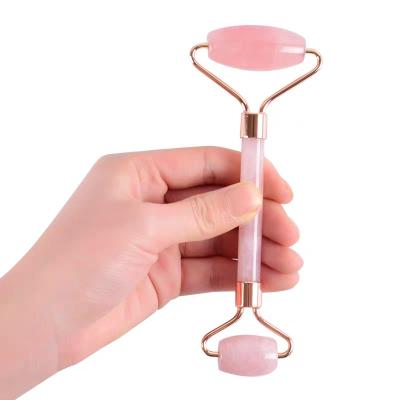 China Besting Selling Face Mounted Liters Natural Stone Roller Therapy Massage Tools for sale