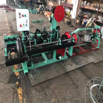 China Building Material Shops GST High Speed Automatic Defense Twisted Barbed Wire Making Machine for sale