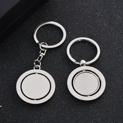 China Laser Logo Stainless Steel Zinc Alloy Custom Metal Rotating Blank Key Ring for sale