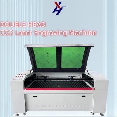 China 1610 Máquina de grabado con láser de doble cabeza de gran superficie 80W 100W 150W 300W en venta