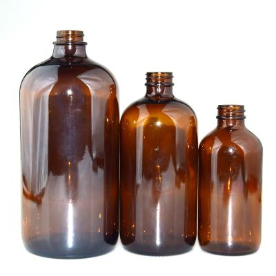 China Personal Care Different Size Amber Botson Round Glass Bottle With Different Cap for sale