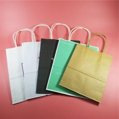China Disposable Flat Handle Customized Design Brown Kraft Paper Bags For Shopping, Packaging, Retail for sale