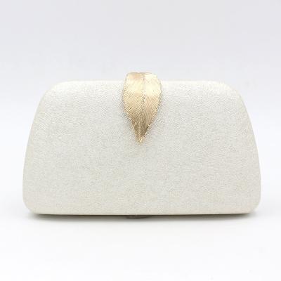 China Luxury High Quality Portable Women Clutch Purse Bag Metal Leaf Decoration Evening Handbag for sale