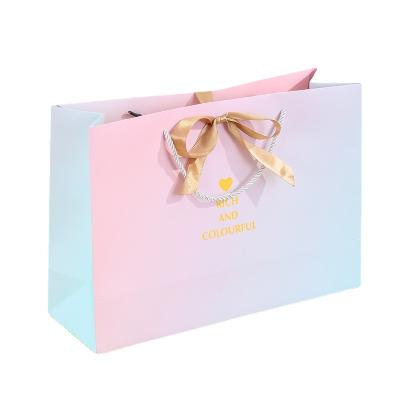 China Recycled Materials New product ins style Packaging Gradual change gift Clothes shop handbag paper bag gift bag for sale