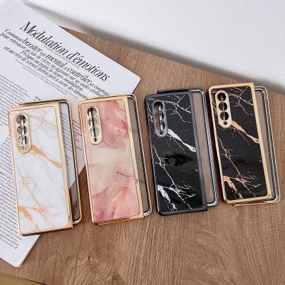 China Beautiful New Shockproof Folding Mobile Phone Plated Marble Case For Samsung Galaxy Z Fold 4 for sale