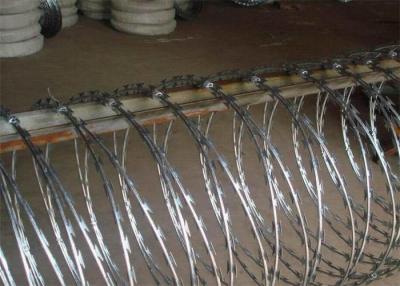 China Hot Dipped Galvanized Concertina Barbed Wire Coil BTO30 Barb Wire Coil for sale