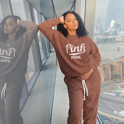 China LANOZY New Arrivals QUICK DRY Letter Printing Women Casual Outfits Round Neck Long Sleeve Loose Plus Size Sweatsuit Pants Two Piece Set for sale