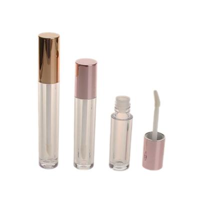 China Empaquetado lindo de 3ml 4ml PETG del lustre redondo claro vacío de lujo del labio con la tapa del oro en venta