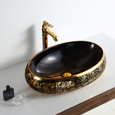 China Modern Design Hotel Sanitary Ware Black Gold Sanitary Ware Countertop Bathroom Ceramic Luxury Sinks for sale