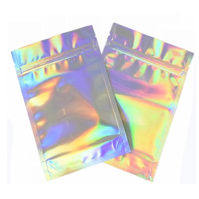 China Small MOQ Stock Mini Hologram Smell Barrier Holographic Mylar Bags Clear Plastic Proof Ziplock Packaging for sale