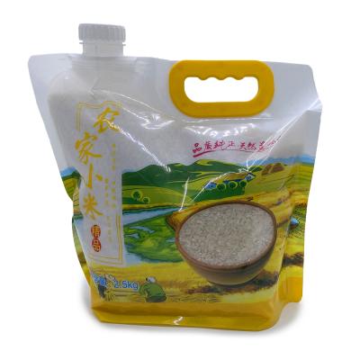 China Custom Clear Shock Resistance Window Stand Up Pouch Sprung Bag With Handle For 2.5kg 5kg Rice Packing for sale