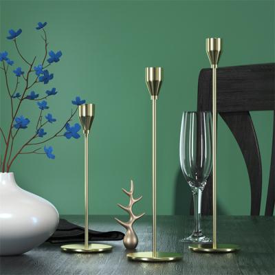 China Metal Stable Fancy Decorative Luxury Table Stand Gold Candle Holders Wedding Decoration Nordic Modern Home Plating for sale