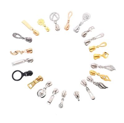 China Custom Metal Zipper Pulls Nickel Free Fashion Decorative Garment Zipper Puller Slider Brand Logo for sale