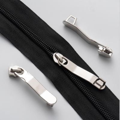 China Custom Logo Embossed Main Zipper Pull Nickel Free Brass Color Metal Metal Zipper Puller Bag Puller Bag Puller for sale