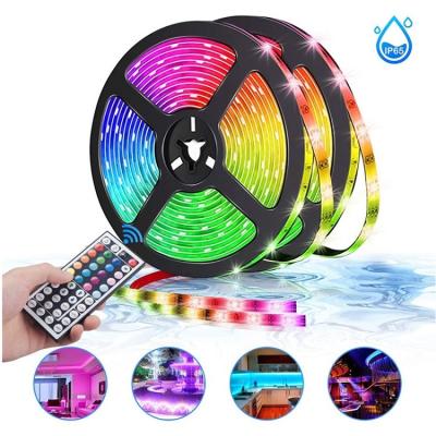 China 12v 150leds residential smd 5050 rgb lux LED smart strip lights waterproof with IR 44 key remote control for sale