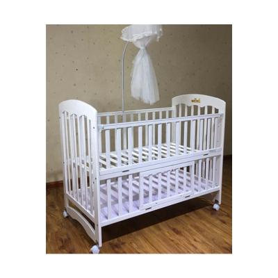 China With Latest Design High Quality Mosquito Net And 4 Wheels Real Wood Baby Crib With Mosquito Net And Storage Large Diaper Baby Hutch for sale