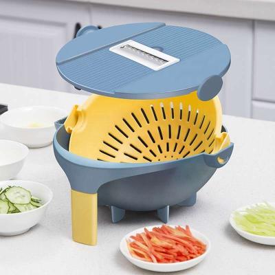 China Viable 8 in 1 Round Vegetable Peeler Multi Function Grater Fruit Different Use Slicer With Water Drip Basket As Seen On TV for sale