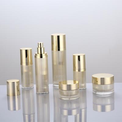 China 15/30/50ml Luxury Gold Cosmetic Empty Acrylic Airless Pump Bottles And Plastic Cream Jars With Lattice Sets for sale