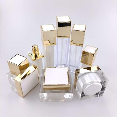 China Luxury Cosmetic Pump Bottle White Square Airless Cosmetic Skin Care Cream Jars Acrylic Containers For Cosmetics for sale