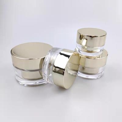 China 10g15g30g50g Cylinder Cosmetic Round Metallized Gold Acrylic Plastic Cream Jar Container With Screw Lids for sale