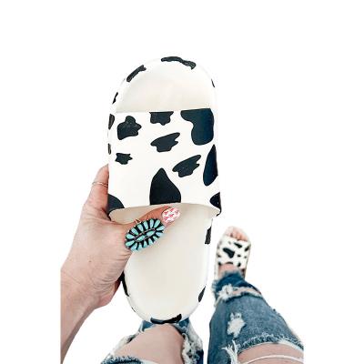 China New Unique Fashion Trend White Cow Print Cork Soled Slippers Soft Rubber Animal Slippers for sale