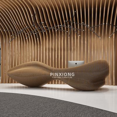 China Creative simple modern high-end special-shaped cashier beauty office reception desk materials bar art customization healthy and environmentally friendly salon for sale