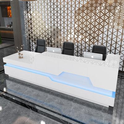 China EUROPEAN Custom Design Standing Wooden Modern Business Front Hotel Reception Desks White Acrylic Metal Customized for sale