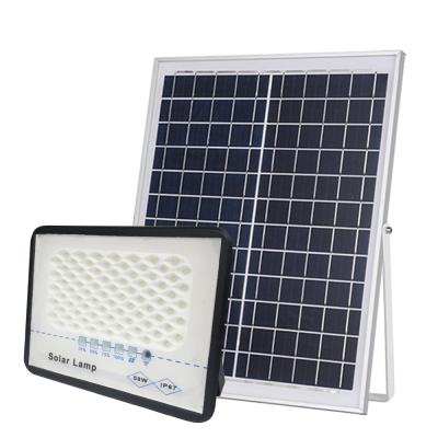 China Plastic Solar Warehouse Lamp 2021 Flood Light Solar Powered Led Garden Stake Lights Price for sale