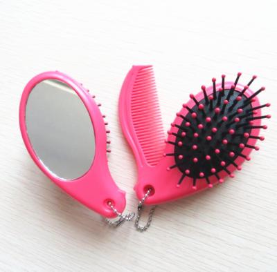 China Plastic Round Fold Up Hair Brush Comb Mirror In One Suitable For Promotion And Travel for sale