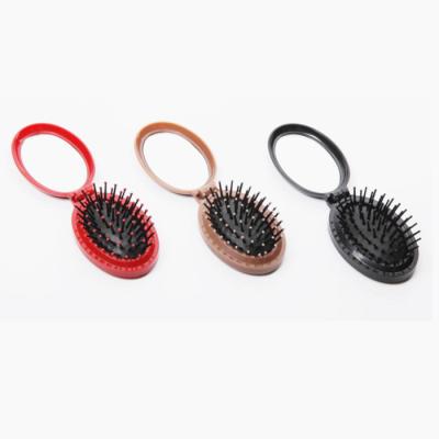 China Cushion Around OVAL Collapsible Hair Brush Mirror for sale