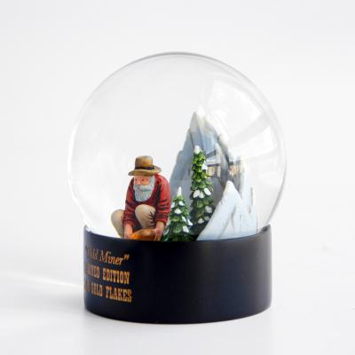 China Luxury Gold Mine Snow Globes 120mm Europe Snow Ornament Custom Forest Ornament Souvenir Resin Snowball Gift for sale