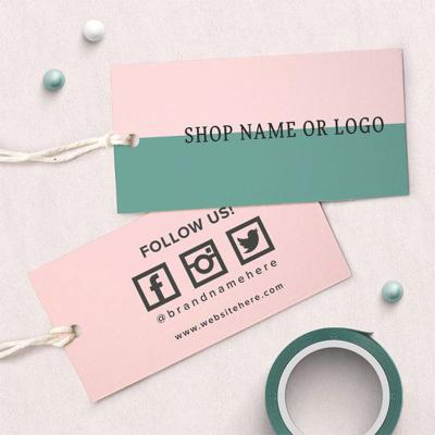 China Sustainable Custom Garment Hang Tags Clothing Brand Tags With Logo For Clothing for sale