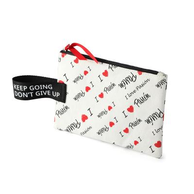 China Custom Lady Travel Pouch Flat ODM Logo New Fashion Canvas Pouch by Fashoion Lovely With Ribbon Zipper Pull Lightweight Cosmetic Bag for sale