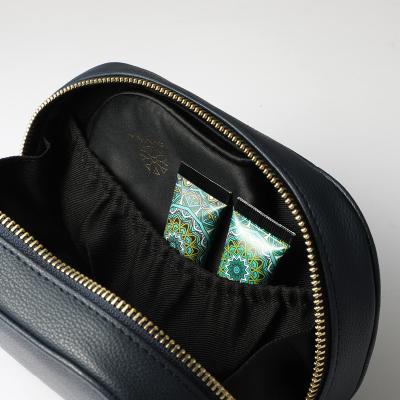 China Internal Pocket Organizer New Fashion ODM PU Fashoion Logo Zipper Bag Lady Travel Pouch Cosmetic Bag Custom Leather Cosmetic Bag Toiletry Bag for sale