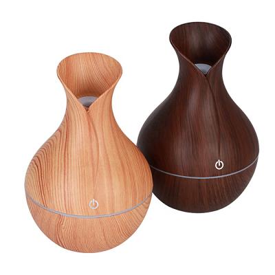 China New Car Air Humidifier Ultrasonic Led Cool-mist Wooden Grain Mini Vase Shape Diffuser Humidifier Portable Humidifier for sale