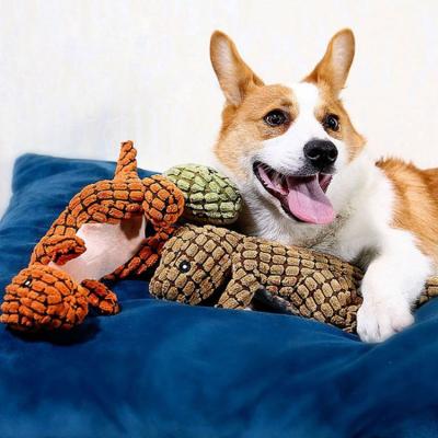 China Viable Custom Pet Toys Dinosaur Shaped Plush Toy Pet Chew Squeaker Toys For Dog for sale