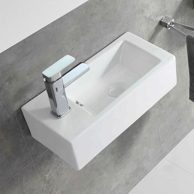 China Ceramic Wall Hung Wash Ware Durable Sanitary White Bathroom Sink Small Basin for sale