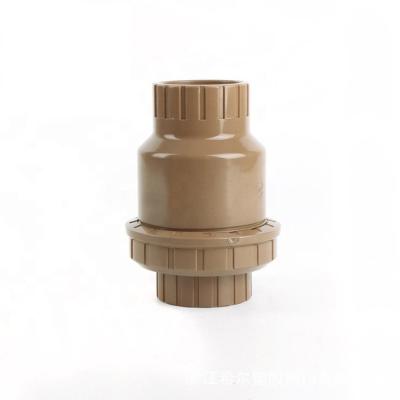 China Plastic Valve 1 Inch Brown Color Vertical PVC Ball Check Valve with Pressure 1.0MPA for sale