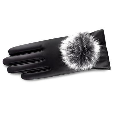 China New Fashion Women's Warm Comfortable And Windproof Ladies Gloves PU Leather Cute Rabbit Fur Ball Winter Warm Gloves for sale