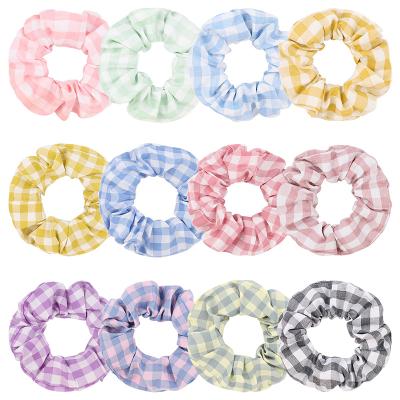 China Newest Fashionable Plaid Hair Scrunchies Korean Polyester Girls Hair Scrunchies Volume for sale