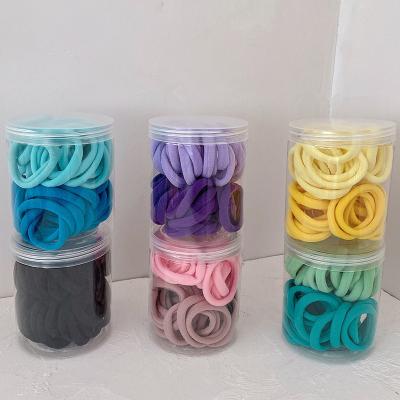 China Hair Decoration Boxes Packed Custom Soft Hair Band Seamless Ponytail Holder Wholesale for sale