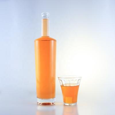 China 750ml Long Neck Flint Glass Bottle with Corks and Acid Etch Surface Handling for sale