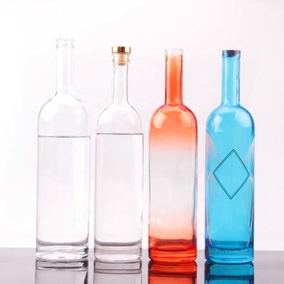 China 750ml Round Shape Glass Vodka Bottle with Cork Cap and Customized Surface Handing for sale