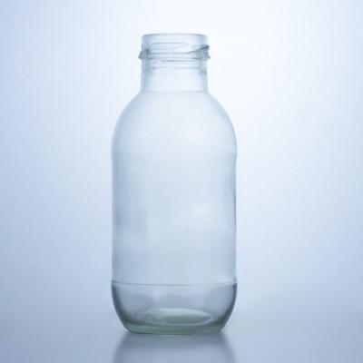 China 300ml Round Glass Milk Bottle with Lid Liquor Storage Solution Decal Surface Handling for sale